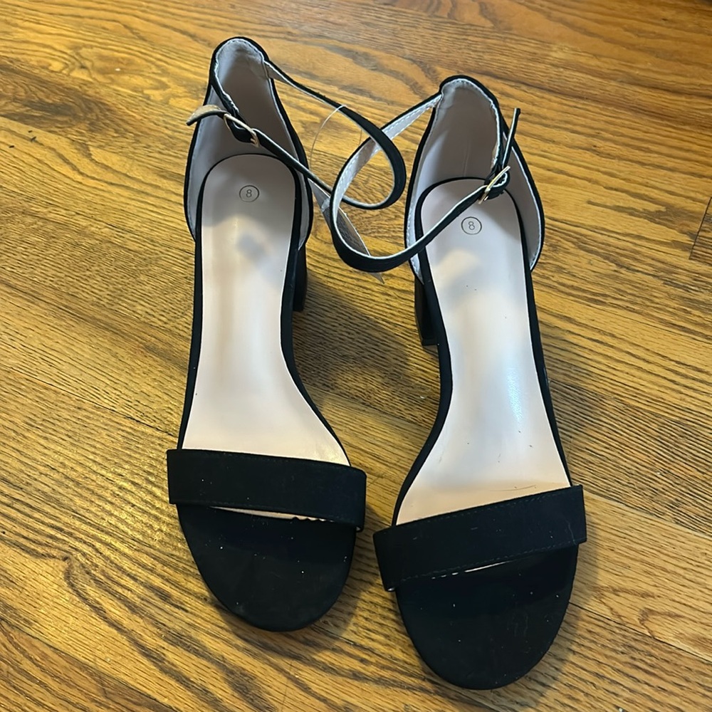 Black suede NWT size 8 chunky heel. 2.5inch heel. Strappy heel sandal